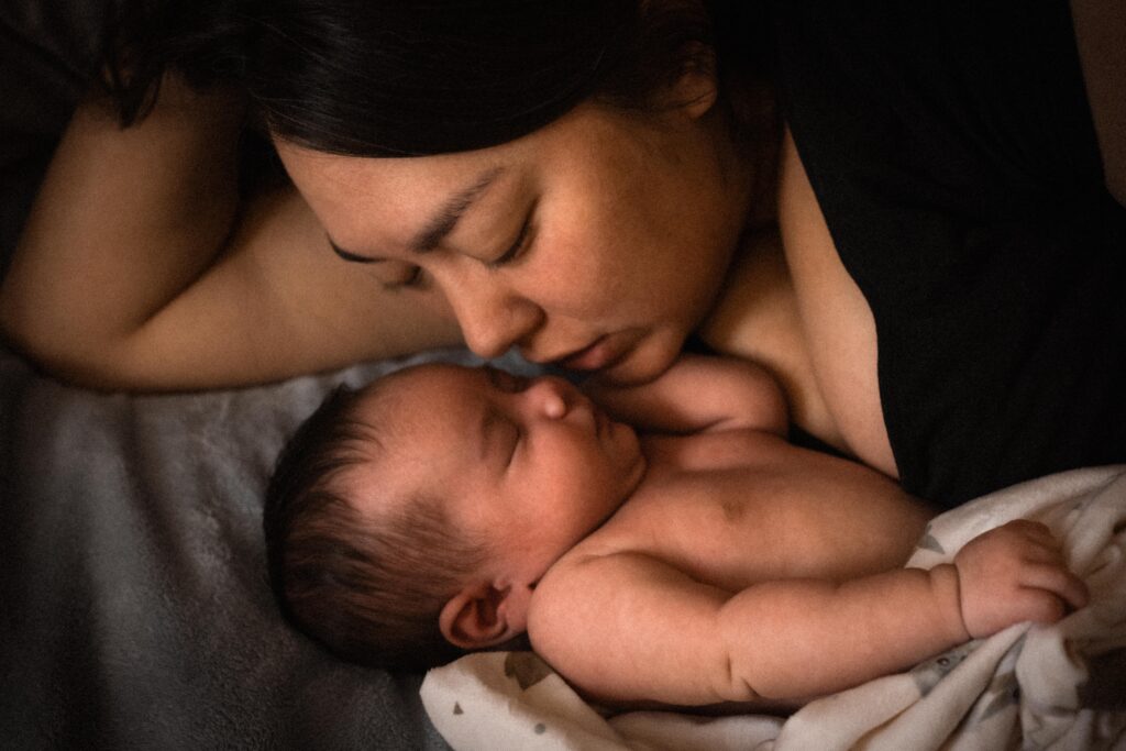 Mother Kissing Baby Newborn Photography Sacramento, CA